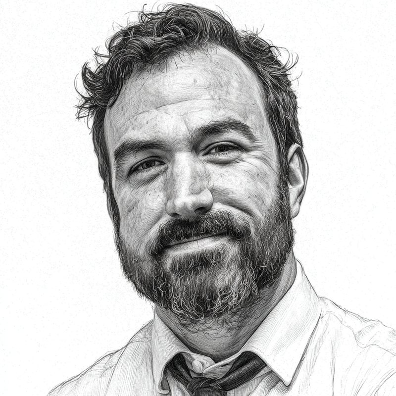 Pen-and-ink style monochrome portrait of the author: a bearded man in a collared shirt and loosened tie, smiling slightly.